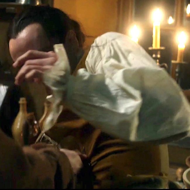 image of a man being stabbed from outlander episode 211